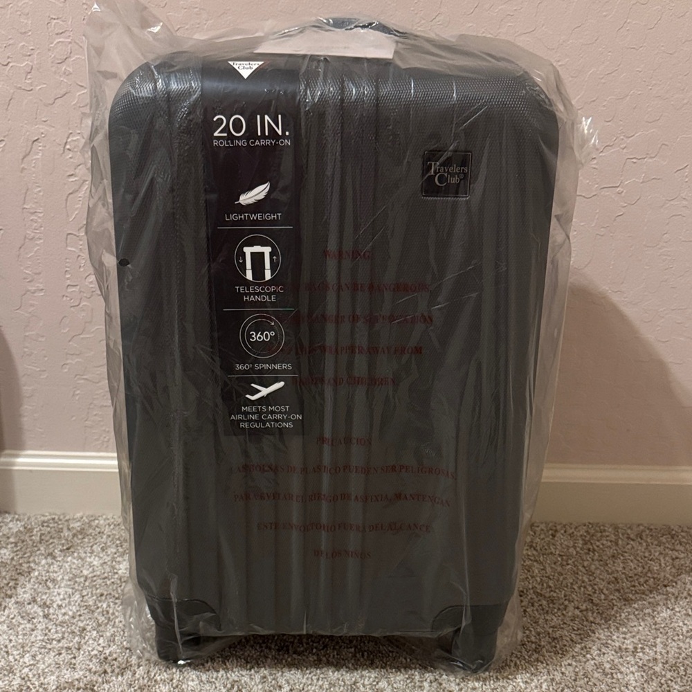 Traveler's Choice Black Rolling Carry-On Luggage